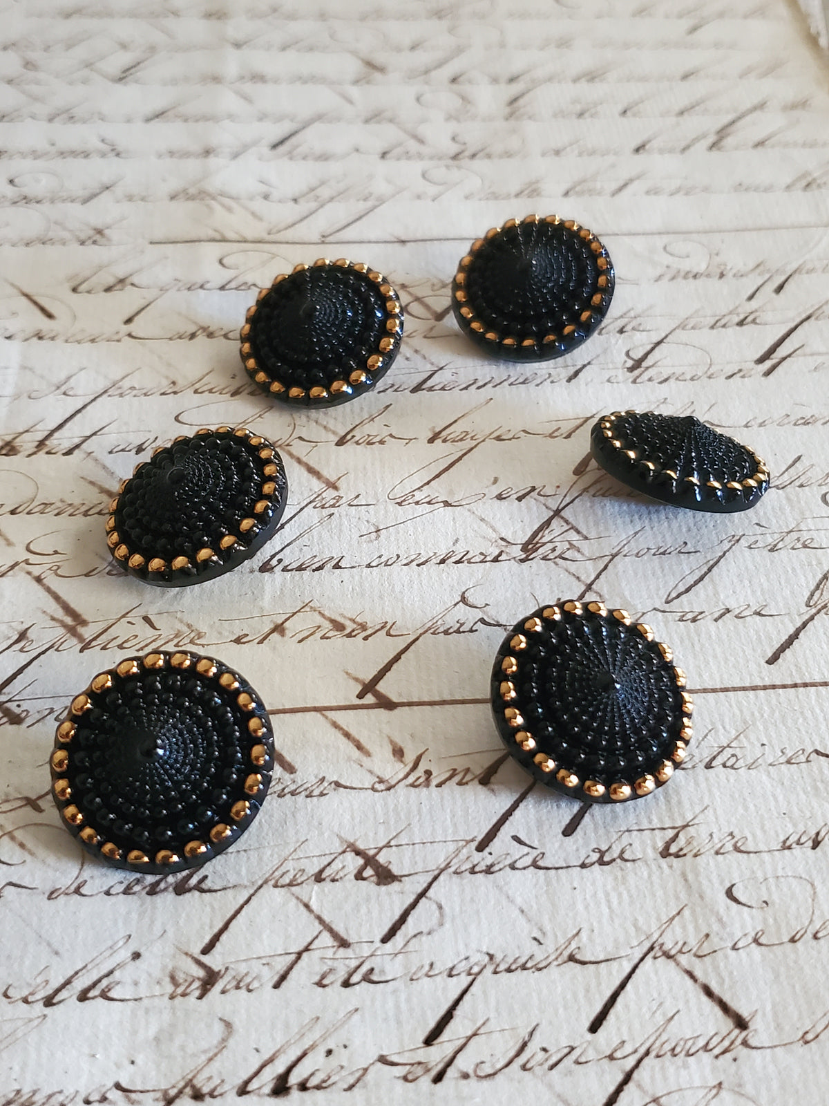 6 Vintage Black and Gold Glass Buttons