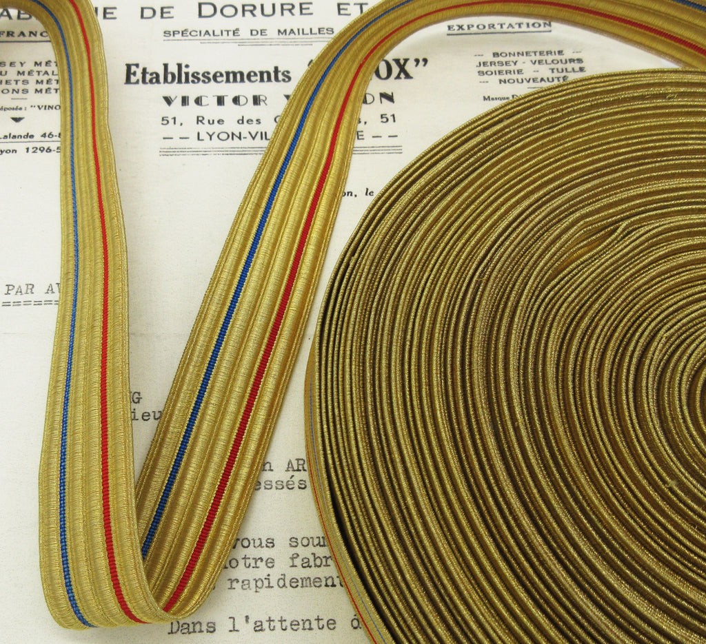 Gold Metallic w/Blue and Red Stripe Trim
