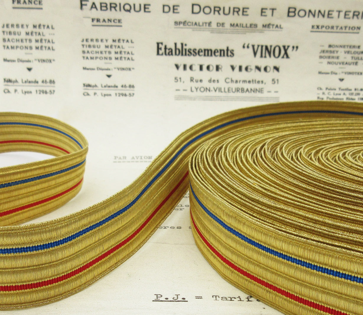 Gold Metallic w/Blue and Red Stripe Trim