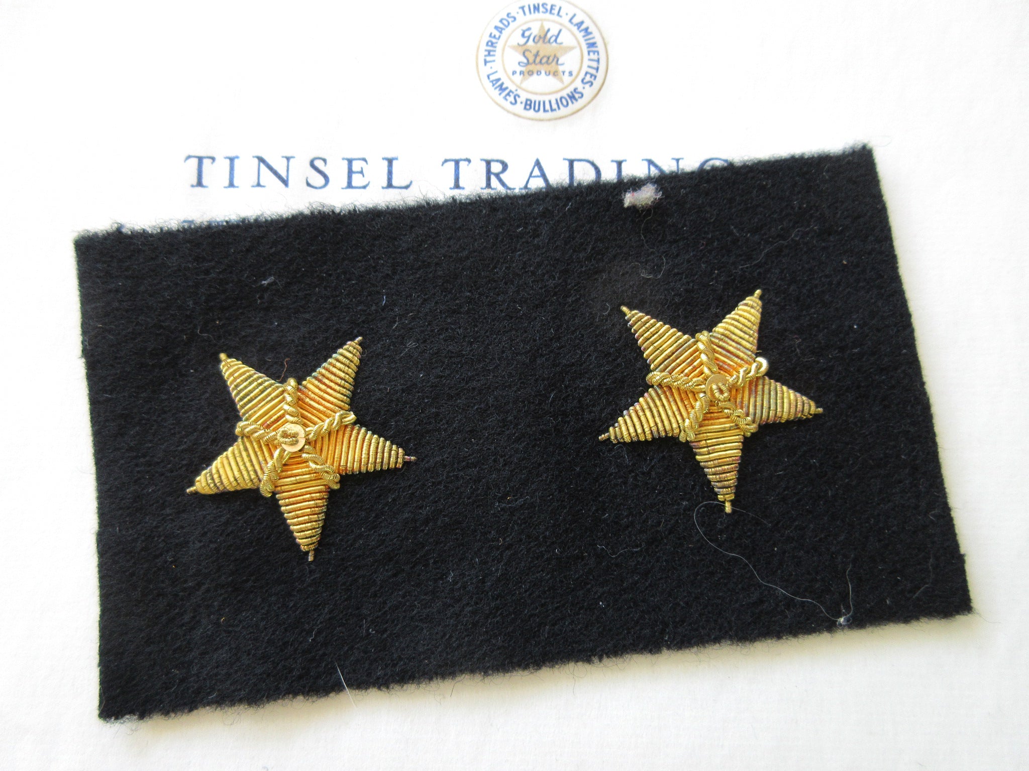 Gold Metallic Bullion Stars on Black Felt Pair