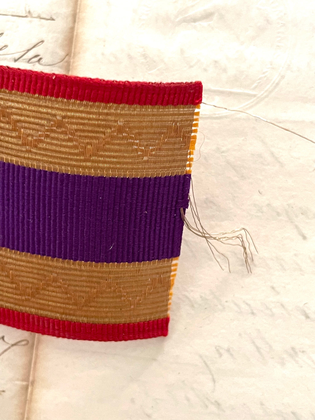 Gold, Purple, and Red Metallic Trim