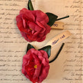 2 Red Camellia’s