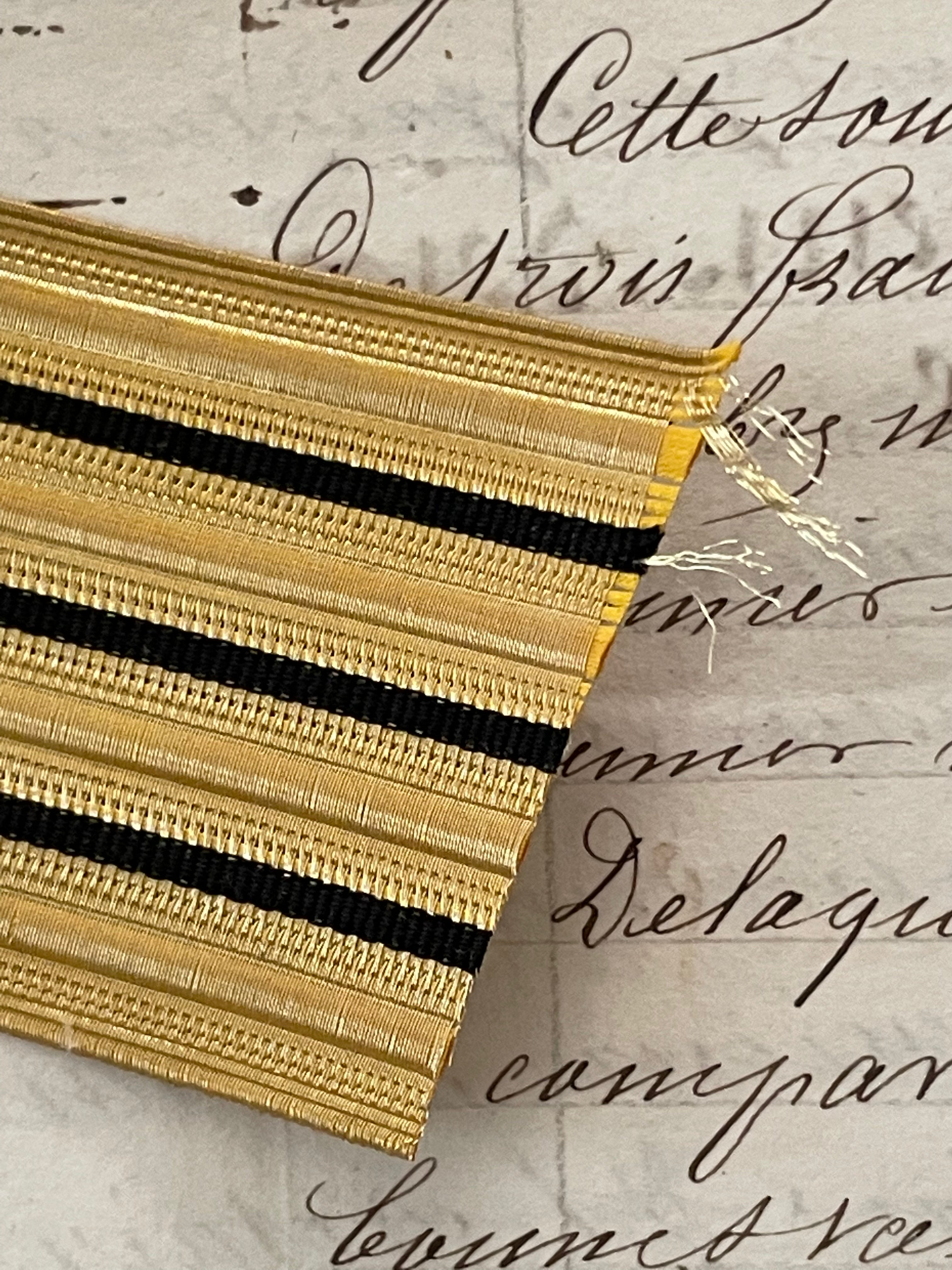 Gold Metallic w/ 3 Black Stripes Trim